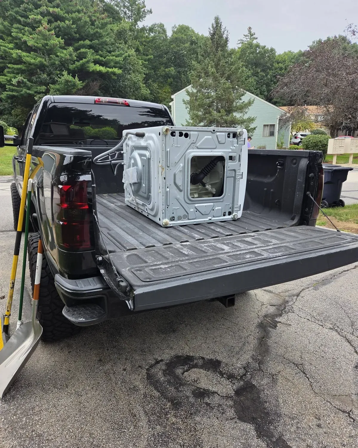 Front-load washer frame in the truck bed