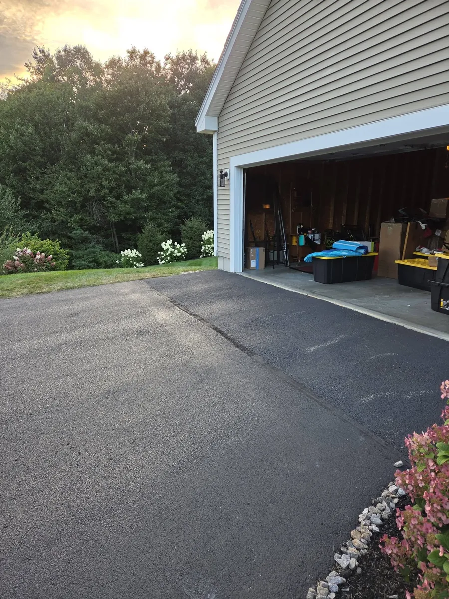 After: the same driveway cleared